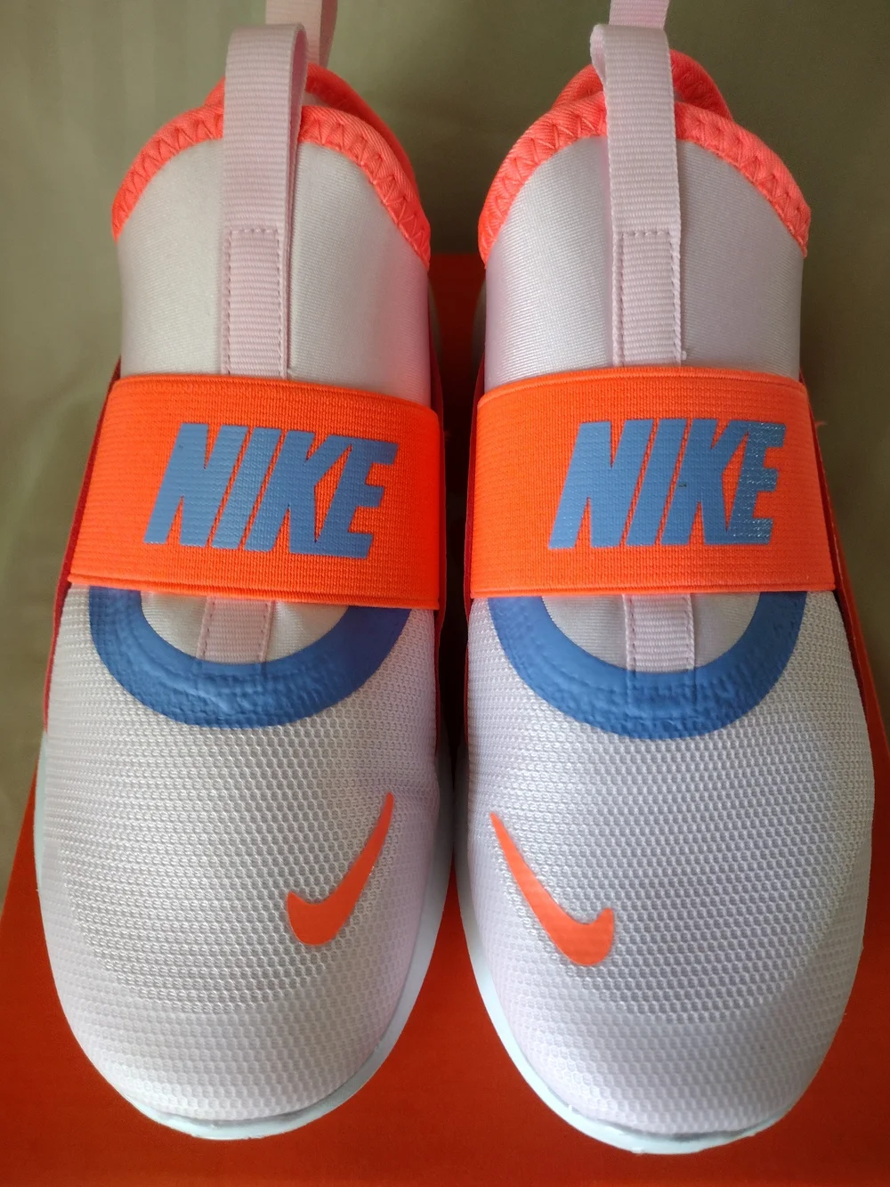 Nike Kids Slip-On Sneakers in White, Coral, Lavender